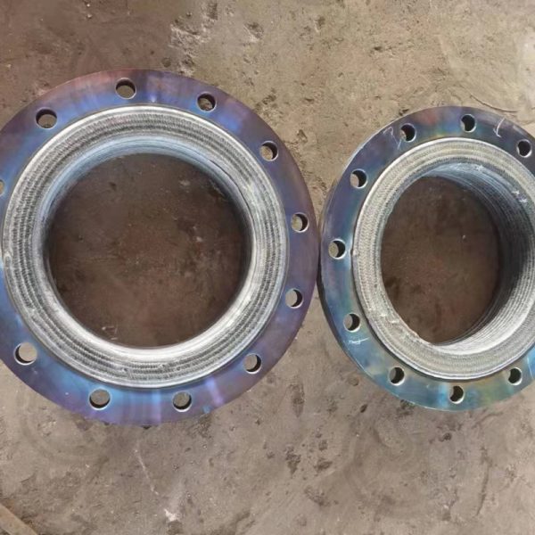 Composite flange surfacing forming 2